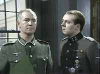 Sturmbannführer Reinicke (Simon Cadell) questions Hoffman's  loyalty (David Calder).