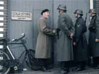 The Germans prepare to search the cold store used by the black marketeers.