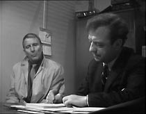 Frank (Alfred Burke) checks in with his probation officer, Jim Hull (John Grieve)