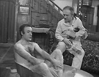 Vic Evans (Victor Spinetti) steals Sid Turner's bath, in an early episode of "Two in Clover"